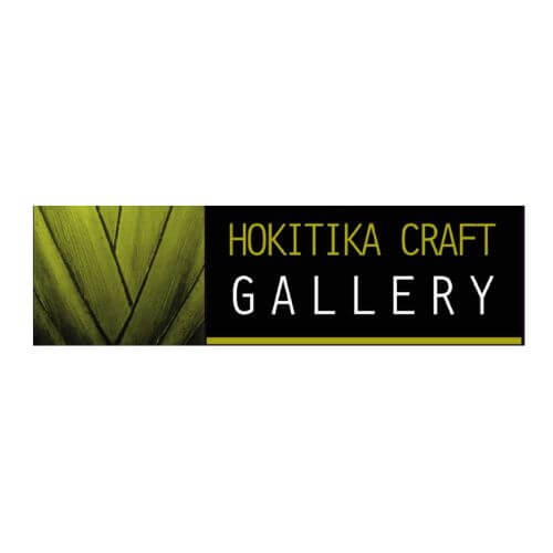 Logo of Hokitika Craft Gallery featuring stylized green fern leaves on the left and the gallery name in yellow and white text on a black background.